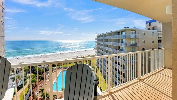 A balcony with a view of a beach and a pool. - Seaside Beach & Racquet 5817 by Liquid Life (Orange Beach)