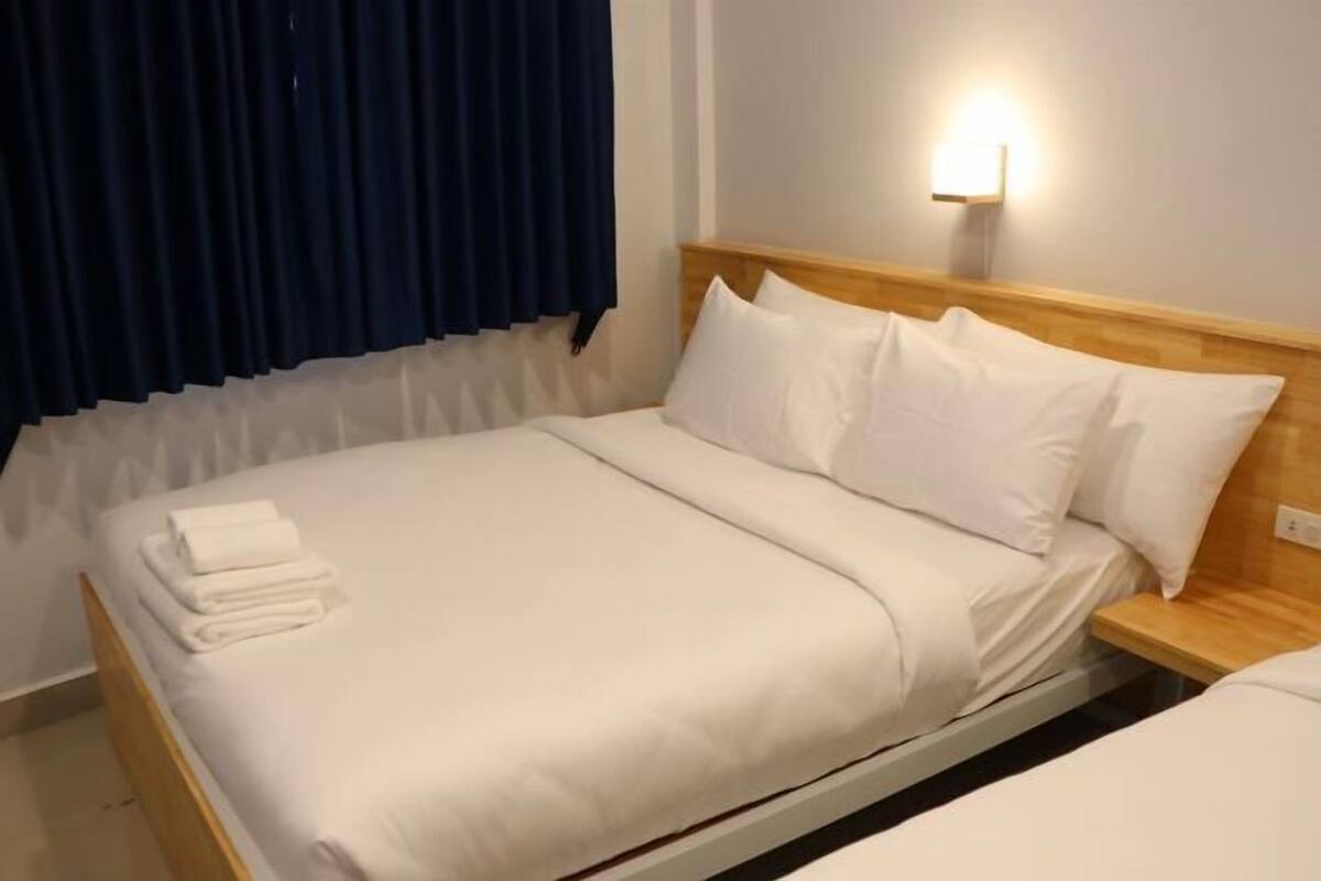 Premium bedding, down comforters, Select Comfort beds, free minibar