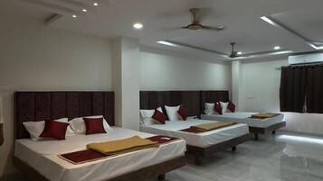 Family Room | Premium bedding, desk, laptop workspace, soundproofing