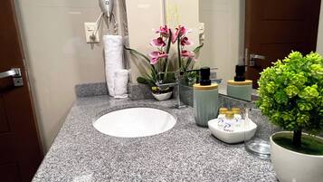 Hair dryer, towels, soap, toilet paper