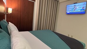 1 habitación, tabla de planchar con plancha y wifi