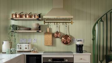 Fridge, stovetop, dishwasher, coffee/tea maker