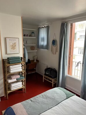 1 bedroom, desk, iron/ironing board, travel crib