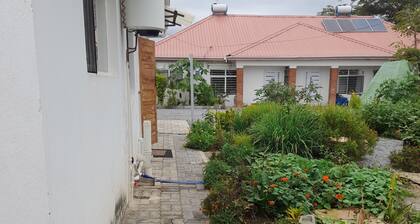 Charming cottage in Lusaka located 5 minutes from Airport with AC, and Wi-Fi.