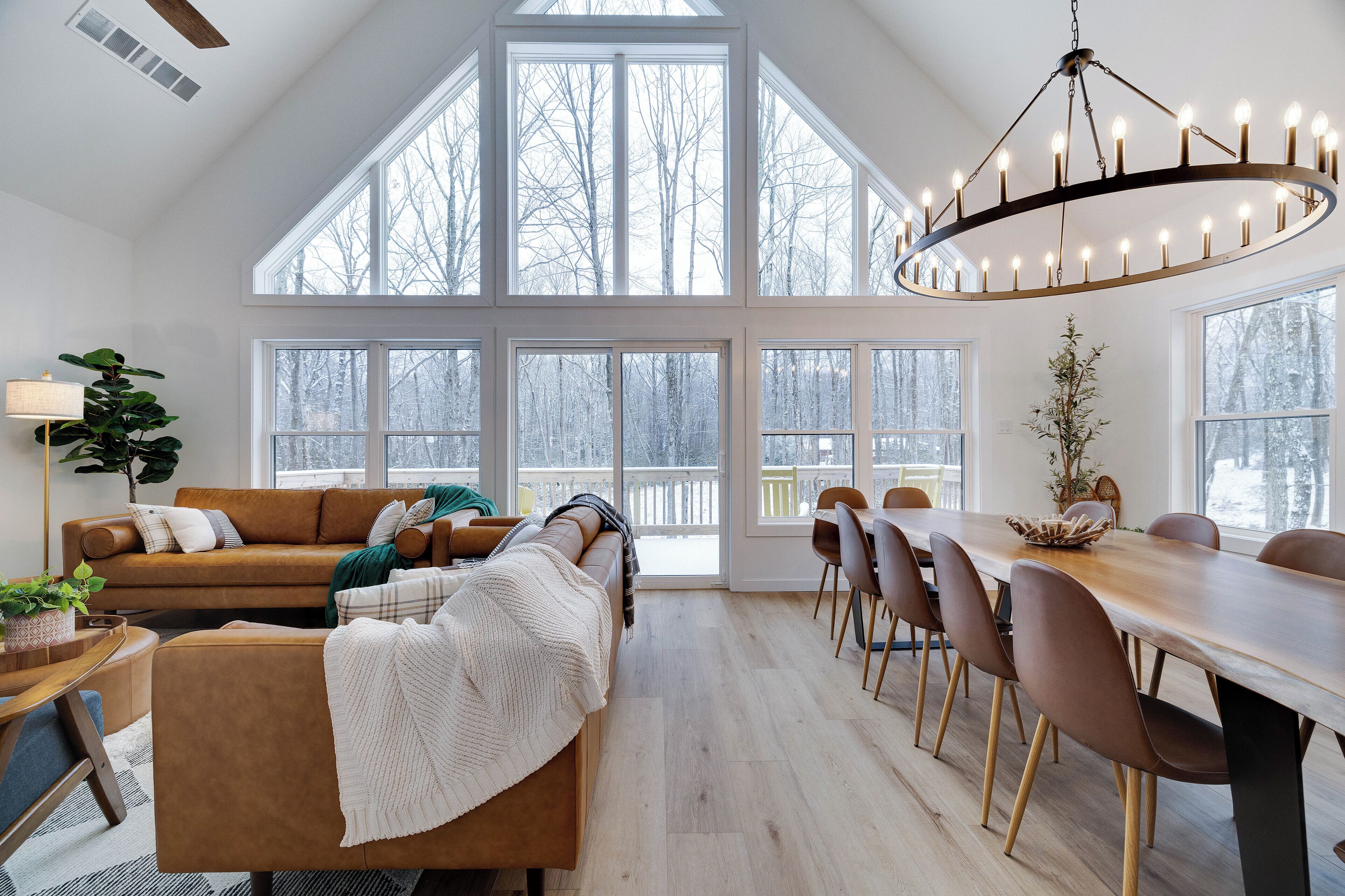 The open concept living & dining space offers ample space for guests to gather.