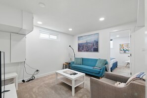 Smart TV, fireplace, books, offices