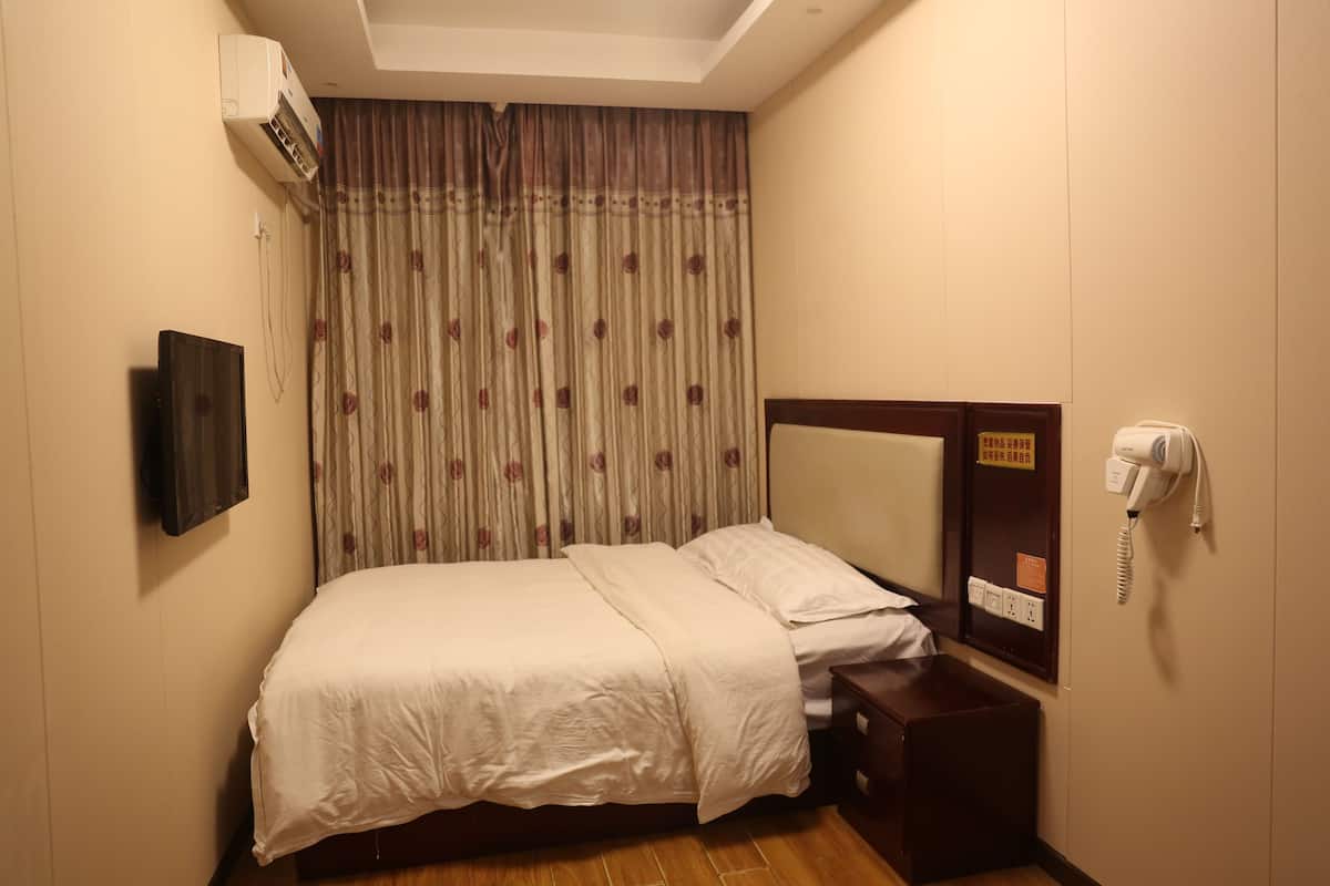Desk, laptop workspace, blackout curtains, free WiFi