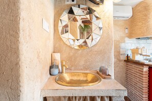 Dutxa, assecador de cabells i tovalloles 