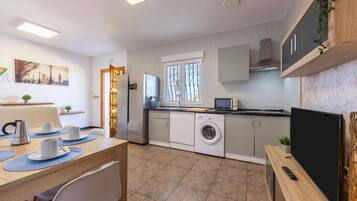 Fridge, microwave, stovetop, coffee/tea maker