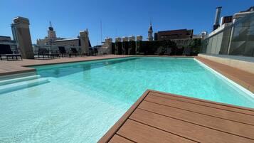 Outdoor pool, open 9:00 AM to 8:00 PM, sun loungers