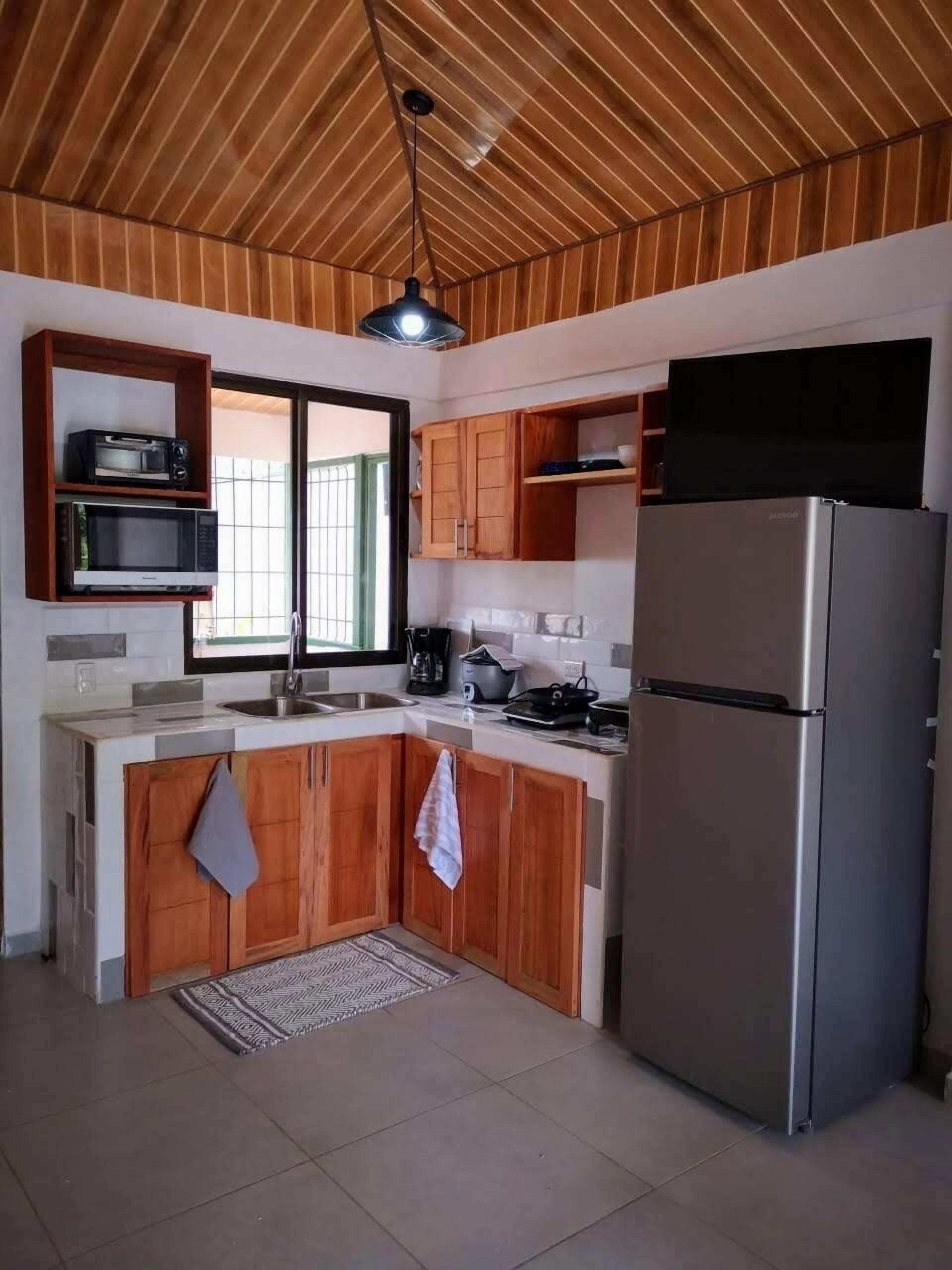 Fridge, microwave, coffee/tea maker, toaster