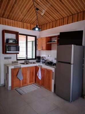 Fridge, microwave, coffee/tea maker, toaster