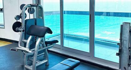 Luxury Home seafront view 1BHK pool gym wifi