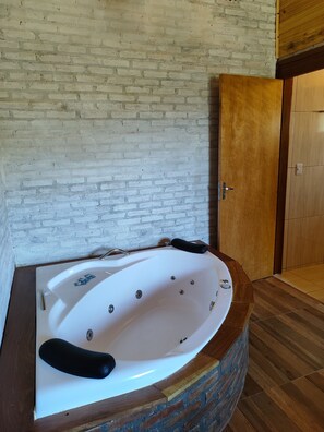 Shower, jetted tub, towels, soap