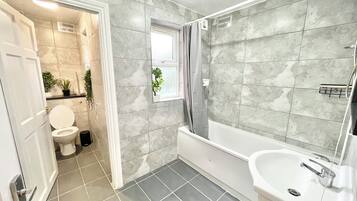 Hair dryer, towels, soap, toilet paper