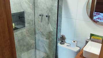 Shower, towels, soap, toilet paper