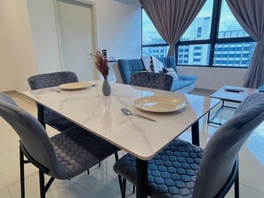 Apartment, 2 Bedrooms | Living area | 40-inch flat-screen TV with cable channels