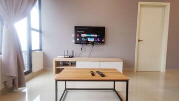 Apartment, 2 Bedrooms | Living area | 40-inch flat-screen TV with cable channels