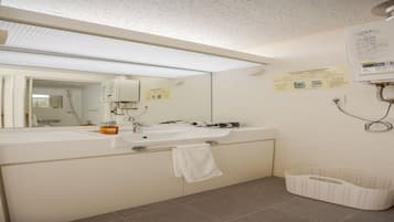 Family Room | Bathroom | Shower, hair dryer, slippers, bidet