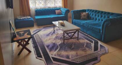 Charming 3-bedroom apartment in gated community. 15 min drive to J.K.I.Airport