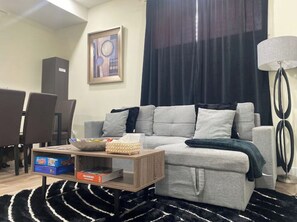 Smart TV, fireplace, books