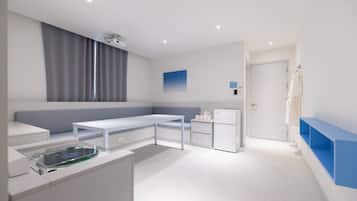 Lounge Room | 1 bedroom, free minibar, desk, free WiFi
