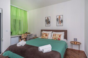 Basic Studio, Balcony, Pool View | Iron/ironing board, free WiFi