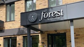 A building with a sign reading "forest RETREAT CENTER". - Forest Retreat Center (Kyiv)