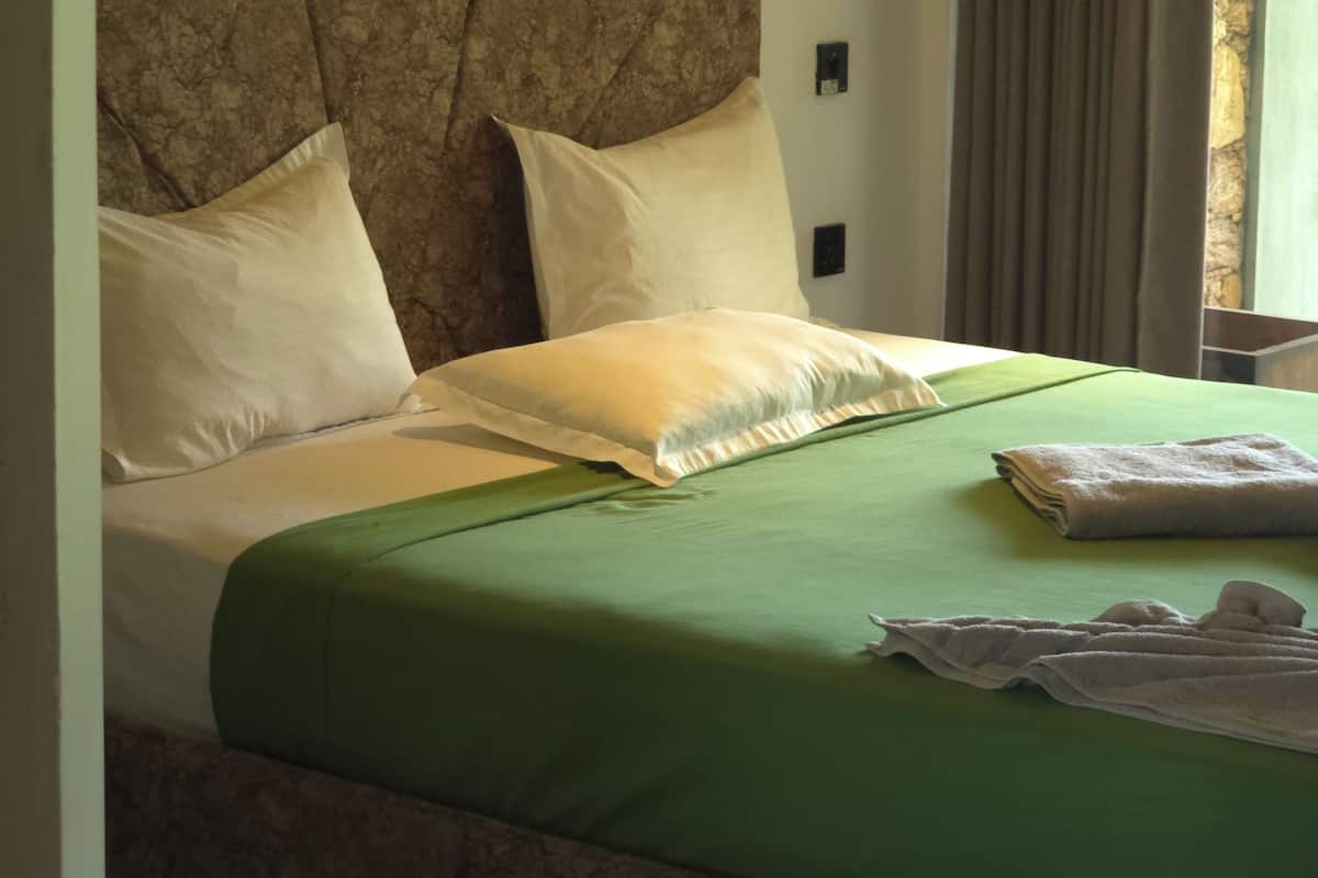 Deluxe Apartment, Balcony, Pool View | Iron/ironing board, free WiFi, bed sheets