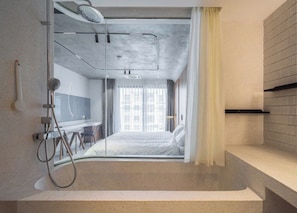 Standard Studio, 1 Bedroom | Bathroom | Deep soaking tub, rainfall showerhead, hair dryer, slippers