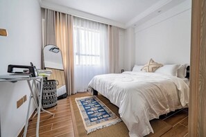 1 غرفة نوم ومكواة/لوح كي وواي فاي وملاءات أسرّة