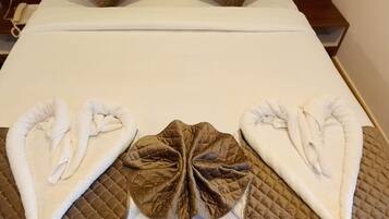 Egyptian cotton sheets, premium bedding, desk, laptop workspace