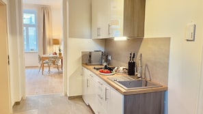 Fridge, stovetop, coffee/tea maker, electric kettle