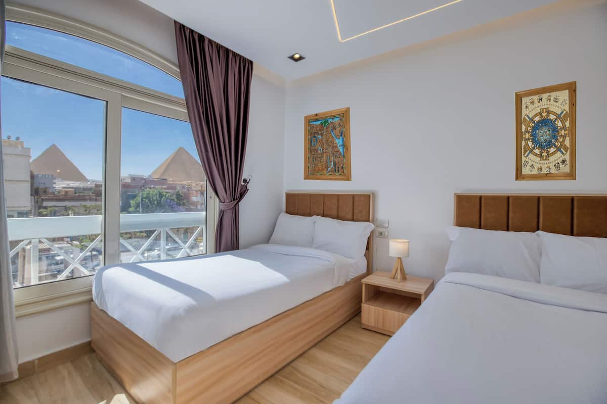 Panoramic Suite, Mountain View | 2 bedrooms, in-room safe, desk, laptop workspace