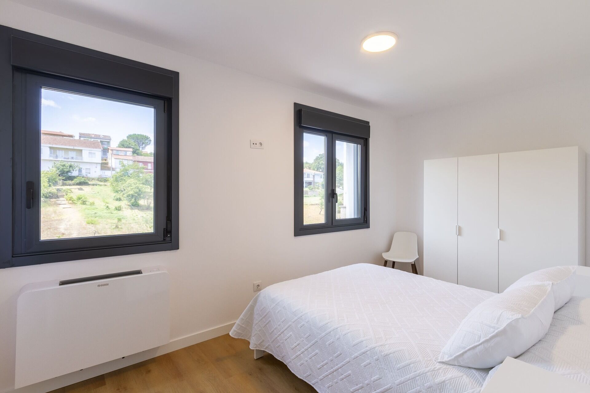 2 slaapkamers, een strijkplank/strijkijzer