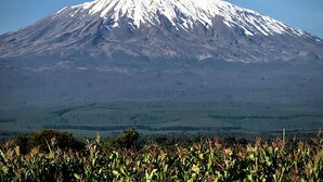 A snow-capped mountain with a clear sky.