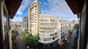A high-rise building with multiple floors, a curved facade, and a prominent 'BLOM BANK' sign. - St.George Temanite Fresh Hansa Home Apt. (Beirut)