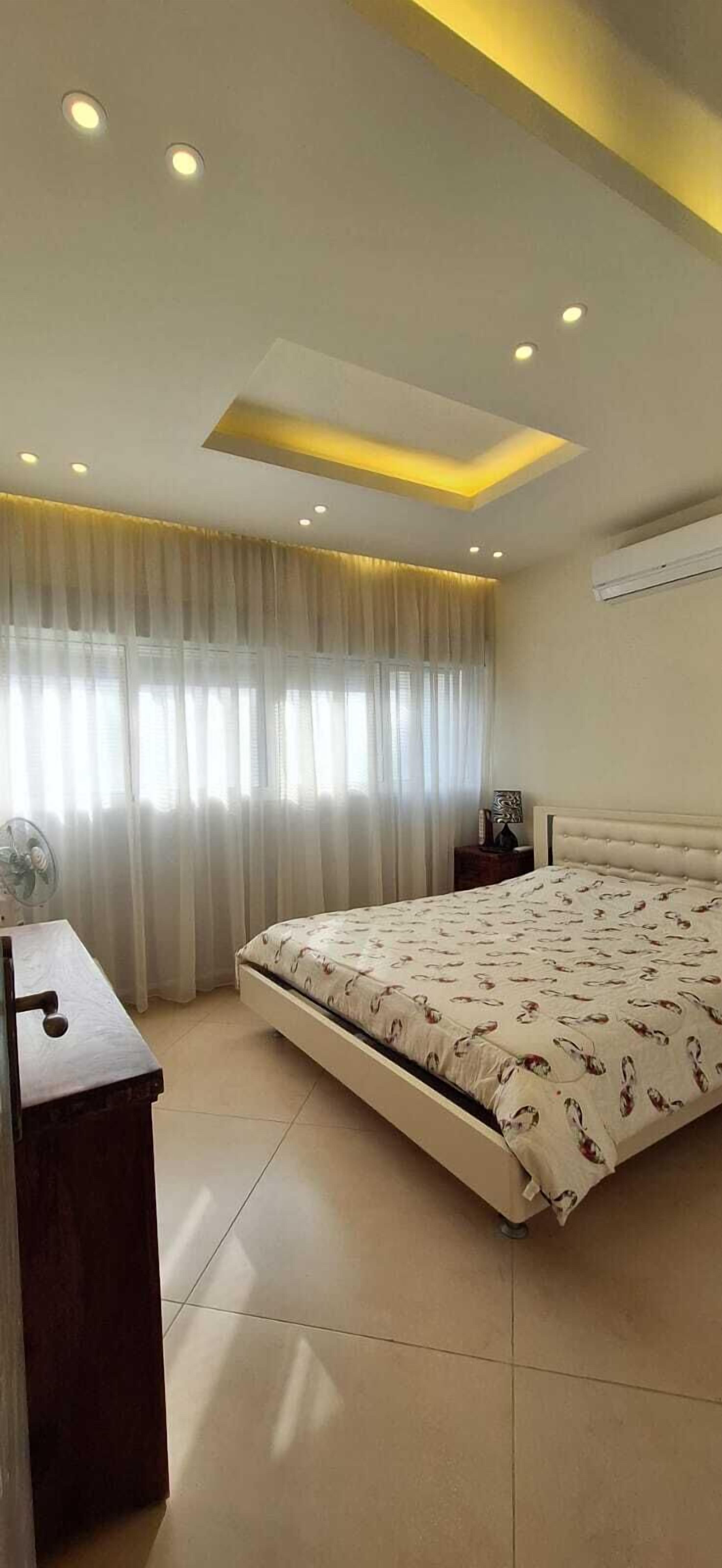 Grand Apartment, Partial Sea View | 2 bedrooms, desk, laptop workspace, blackout curtains