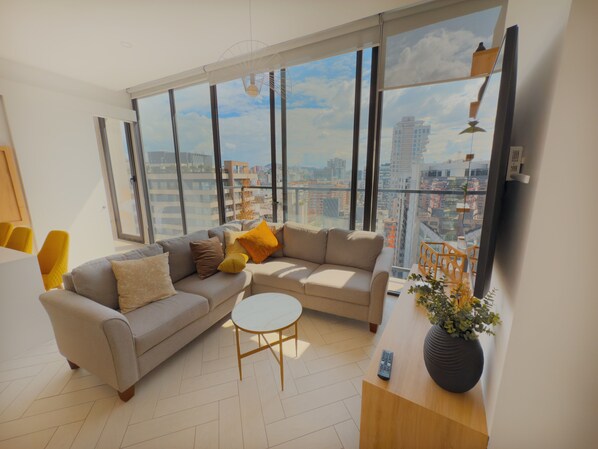 Apartamento superluxo, vista para a cidade | Área de estar