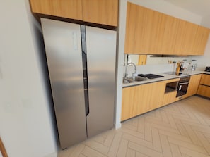 Apartamento de lujo, vistas a la ciudad | Cocina privada