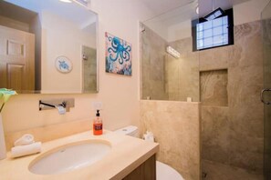 Hair dryer, towels, soap, toilet paper