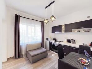 Deluxe-Apartment, 1 Schlafzimmer, Nichtraucher, Terrasse | Eigene Küche | Wasserkocher, Toaster