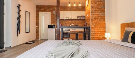 Studio, 1 Queen Bed, Non Smoking, Patio | 1 bedroom, blackout curtains, soundproofing, iron/ironing board