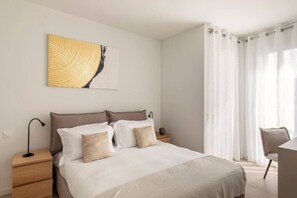 1 bedroom, desk, iron/ironing board, travel crib