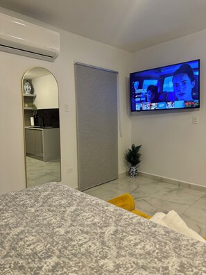 1 habitación, tabla de planchar con plancha y wifi