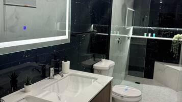 Shower, towels, soap, shampoo