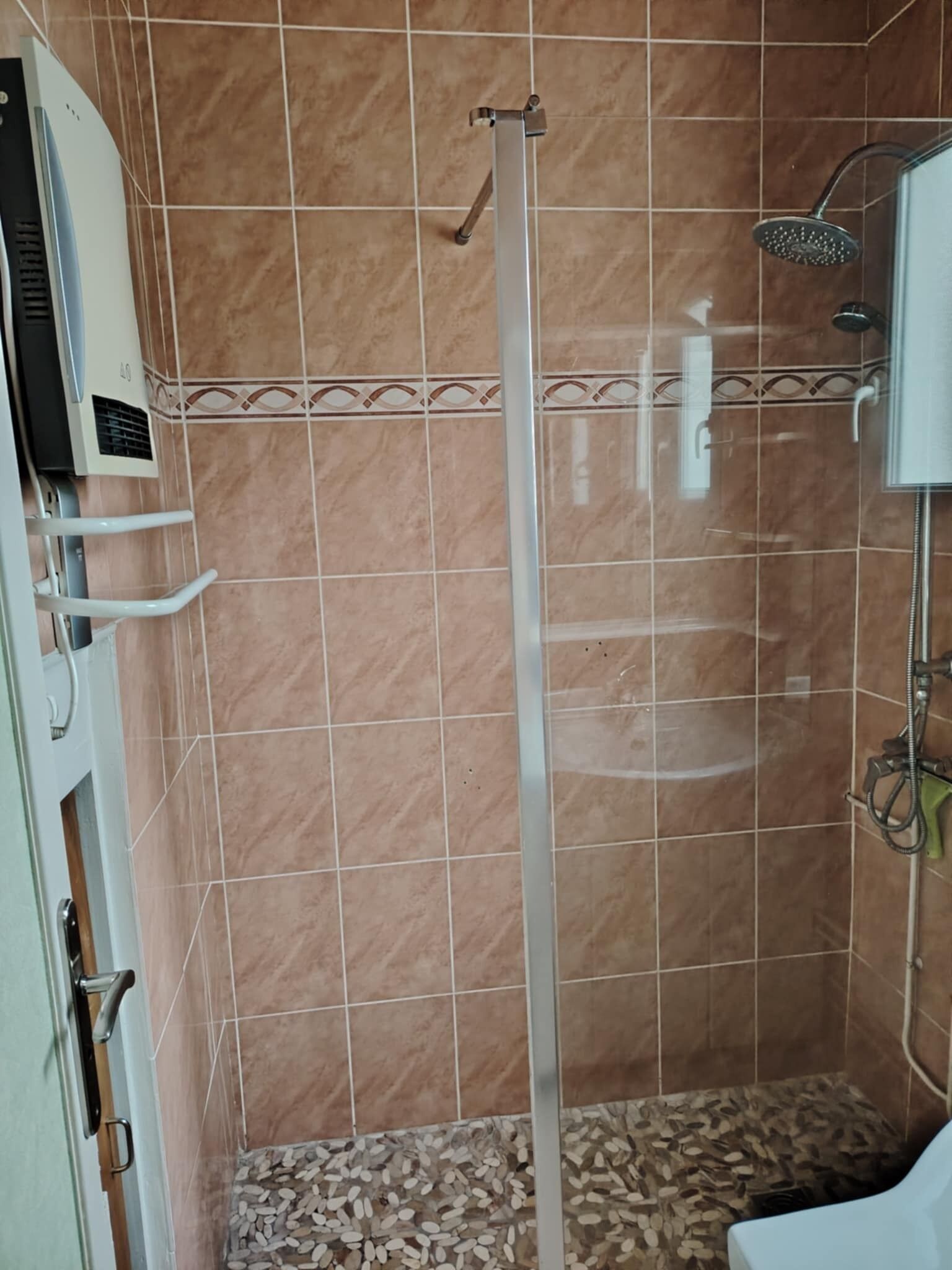 Shower, towels, soap, toilet paper