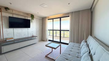 Premium Apartment | Living area | 50-inch Smart TV with digital channels
