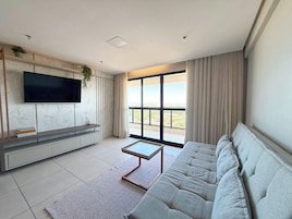 Premium Apartment | Living area | 50-inch Smart TV with digital channels