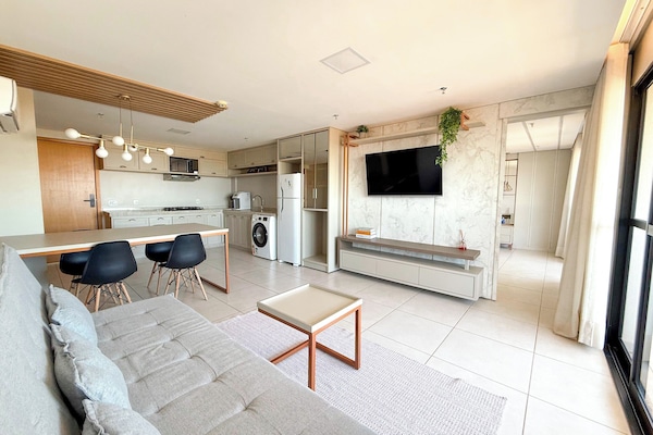 Apartamento premium | Área de estar | Smart TV 50 polegadas com canais digitais